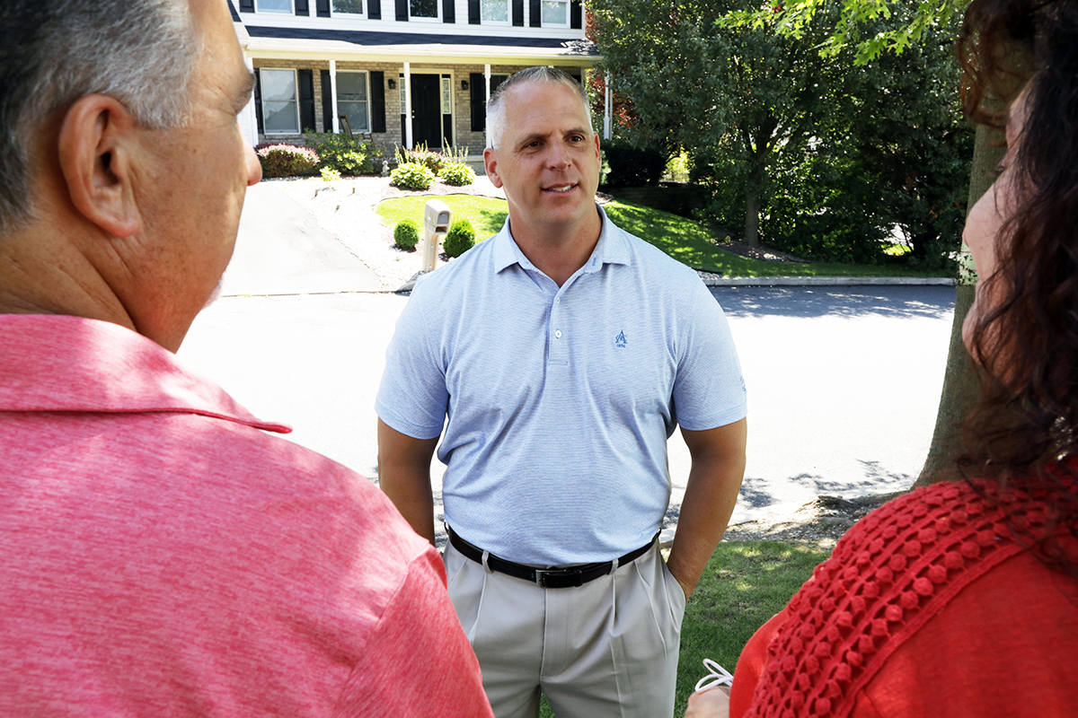 Image of Joe Emrick speaking with his constituents