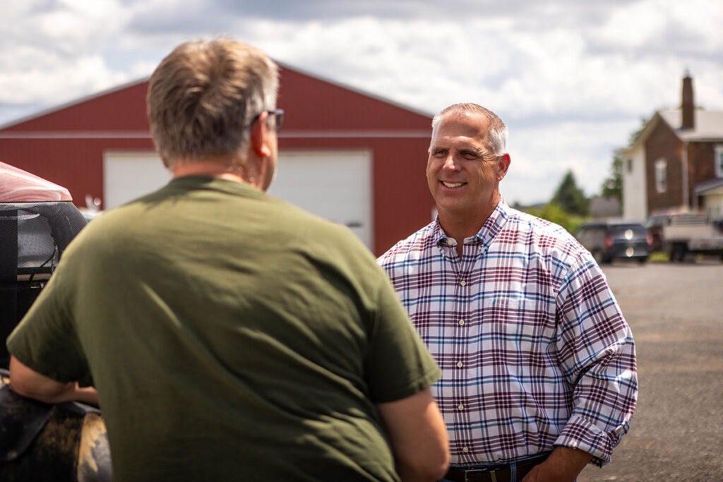 Image of Joe Emrick speaking with his constituents